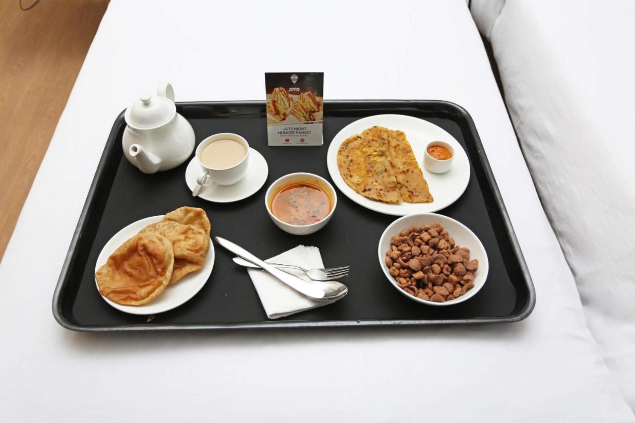 Hôtel Oyo 28303 Yesh Comforts à Madikeri Extérieur photo